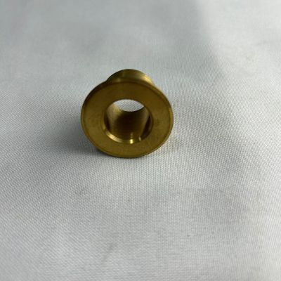 BUJE CILINDRICO CON PESTAÑA PUERTA DE SERVICIO